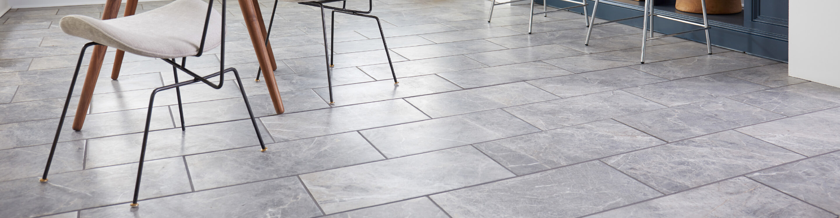 gray flooring tiles in kitchen with charis