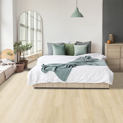 luxury vinyl plank flooring in bedroom with cohesive color palette